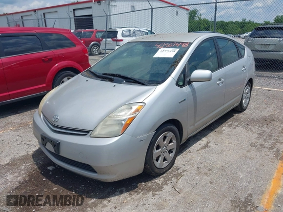 2007 Toyota Prius z VIN JTDKB20U277563022, wystawiony jako IAAI lot #42551498 z przebiegiem 228 017 mil mil oraz . Historia ofert i sprzedaży dostępna na DreamBid. Obrazek 6.