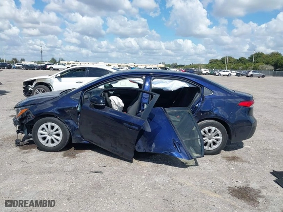 2020 Toyota Corolla Hybrid LE with VIN JTDEBRBE8LJ031556, listed as a IAAI auction lot 41576129 with 103,989 mi miles. Bid and sale history available at carsss.com. Image 15.