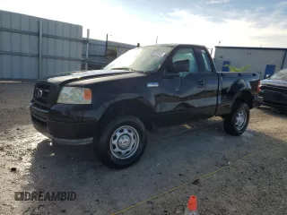 2007 Ford F-150 STX with VIN 1FTRF02297KD15057, listed as a Copart auction lot 73847974 with 184,413 mi miles and Salvage Title. Bid and sale history available at carsss.com. Image 1.