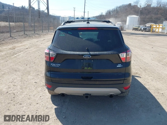2017 Ford Escape SE with VIN 1FMCU9G98HUB94481, listed as a IAAI auction lot 41795259 with 114,209 mi miles. Bid and sale history available at carsss.com. Image 16.