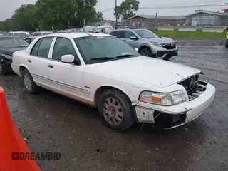 2006 Mercury Grand Marquis LS Premium z VIN 2MEHM75V36X655119, wystawiony jako IAAI lot #42179899 z przebiegiem 158 653 mil mil oraz . Historia ofert i sprzedaży dostępna na DreamBid. Obrazek 1.