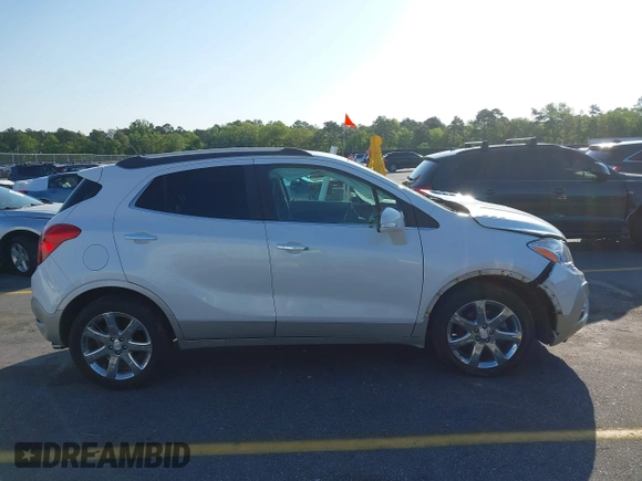 2016 Buick Encore Premium with VIN KL4CJDSB1GB647306, listed as a IAAI auction lot 41983159 with 59,592 mi miles. Bid and sale history available at carsss.com. Image 13.
