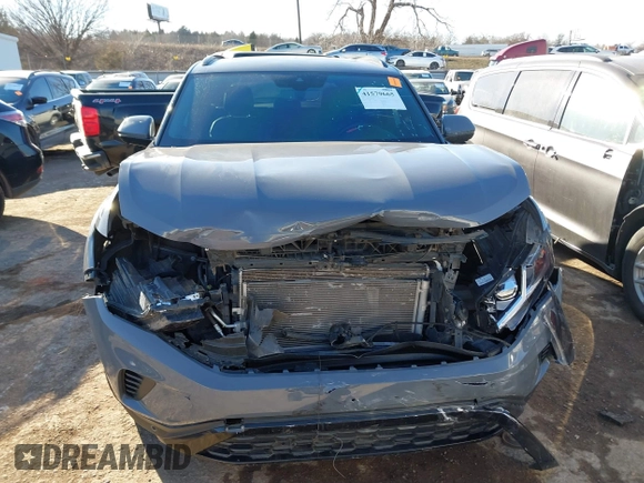 2021 Volkswagen Atlas SEL Premium with VIN 1V2TE2CAXMC215550, listed as a IAAI auction lot 41579665 with 55,264 mi miles and . Bid and sale history available at DreamBid. Image 12.