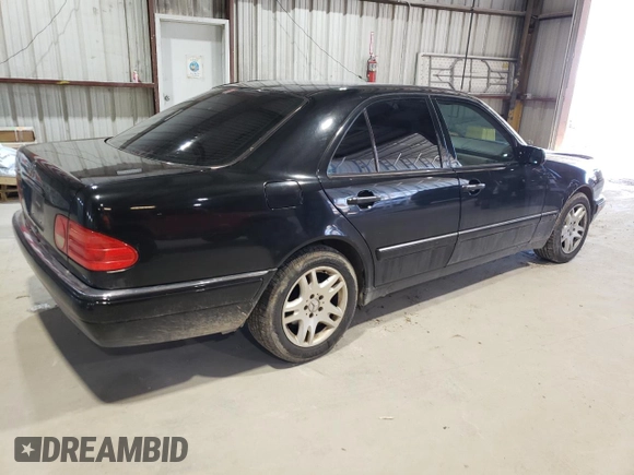 1998 Mercedes-Benz E-Class with VIN WDBJF65FXWA648112, listed as a Copart auction lot 47074665 with 0 mi miles and Salvage Title. Bid and sale history available at carsss.com. Image 3.