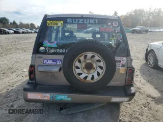 1995 Suzuki Sidekick JX z VIN 2S3TD03V2S6408939, wystawiony jako Copart lot #78862794 z przebiegiem 88 216 mil mil oraz Tytuł czysty. Historia ofert i sprzedaży dostępna na DreamBid. Obrazek 6.