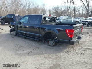 2023 Ford F-150 XL with VIN 1FTEW1EP3PKD48647, listed as a IAAI auction lot 40584659 with 50,841 mi miles. Bid and sale history available at carsss.com. Image 3.
