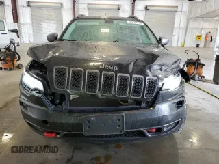 2019 Jeep Cherokee Trailhawk with VIN 1C4PJMBX1KD456551, listed as a Copart auction lot 58576065 with 121,259 mi miles and Salvage title. Bid and sale history available at DreamBid. Image 5.