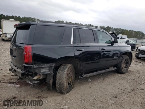 2020 Chevrolet Tahoe LS z VIN 1GNSCAKC1LR280726, wystawiony jako Copart lot #43128095 z przebiegiem 89 050 mil mil oraz Szkoda całkowita • Salvage title. Historia ofert i sprzedaży dostępna na DreamBid. Obrazek 3.