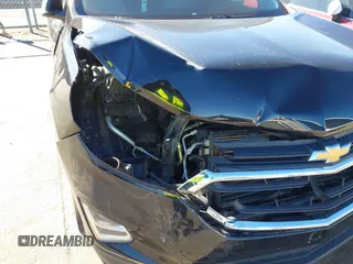 2020 Chevrolet Equinox LS z VIN 2GNAXHEV4L6151980, wystawiony jako IAAI lot #41274204 z przebiegiem 110 417 mil mil oraz . Historia ofert i sprzedaży dostępna na DreamBid. Obrazek 6.