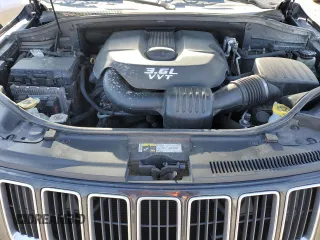2014 Jeep Grand Cherokee Laredo with VIN 1C4RJFAG4EC210321, listed as a Copart auction lot 53574595 with 119,650 mi miles and Salvage Title. Bid and sale history available at DreamBid. Image 12.