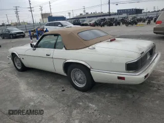 1994 Jaguar XJS with VIN SAJNX2749RC191243, listed as a Copart auction lot 76037994 with 74,842 mi miles and Salvage Title. Bid and sale history available at carsss.com. Image 2.