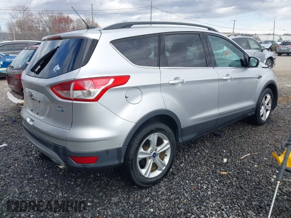 2014 Ford Escape SE with VIN 1FMCU9GX3EUD05447, listed as a IAAI auction lot 41817513 with 155,101 mi miles. Bid and sale history available at carsss.com. Image 4.