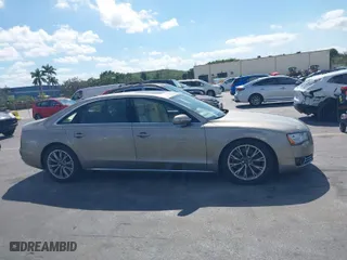 2012 Audi A8 L with VIN WAURVAFD0CN001646, listed as a IAAI auction lot 41524110 with 105,187 mi miles. Bid and sale history available at carsss.com. Image 13.