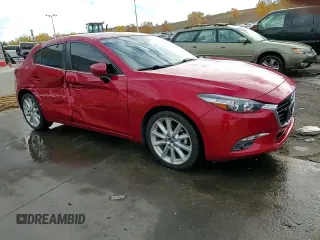 2017 Mazda 3 Grand Touring with VIN JM1BN1M37H1126947, listed as a Copart auction lot 77704214 with 70,970 mi miles and Salvage Title. Bid and sale history available at DreamBid. Image 13.