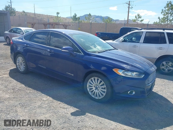 2014 Ford Fusion SE Hybrid with VIN 3FA6P0LUXER220053, listed as a IAAI auction lot 42229079 with 187,199 mi miles and . Bid and sale history available at DreamBid. Image 1.