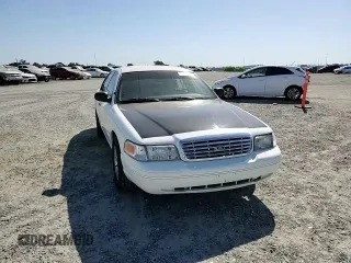 2005 Ford Police Interceptor z VIN 2FAFP71W95X144873, wystawiony jako Copart lot #58260905 z przebiegiem 135 986 mil mil oraz Szkoda całkowita • Salvage title. Historia ofert i sprzedaży dostępna na DreamBid. Obrazek 13.