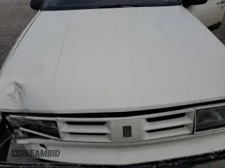 1991 Oldsmobile Delta z VIN 1G3HN54C1M1804698, wystawiony jako Copart lot #69833034 z przebiegiem 174 625 mil mil oraz Szkody całkowita. Historia ofert i sprzedaży dostępna na DreamBid. Obrazek 11.