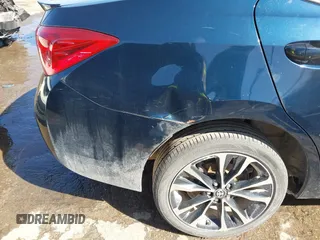2017 Toyota Corolla L z VIN 5YFBURHE0HP721258, wystawiony jako IAAI lot #41706824 z przebiegiem 158 554 mil mil oraz . Historia ofert i sprzedaży dostępna na DreamBid. Obrazek 22.