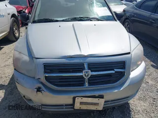 2011 Dodge Caliber Mainstreet with VIN 1B3CB3HAXBD107494, listed as a IAAI auction lot 42071328 with 146,936 mi miles. Bid and sale history available at carsss.com. Image 6.