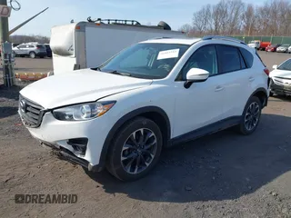 2016 Mazda CX-5 Grand Touring with VIN JM3KE4DYXG0836692, listed as a IAAI auction lot 41812584 with 119,302 mi miles. Bid and sale history available at carsss.com. Image 17.