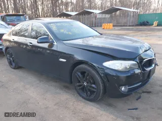 2013 BMW 5 Series 528i xDrive with VIN WBAXH5C58DD107515, listed as a IAAI auction lot 41673214 with 115,726 mi miles. Bid and sale history available at carsss.com. Image 1.