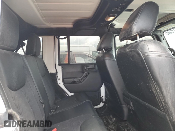 2017 Jeep Wrangler Unlimited Sahara with VIN 1C4BJWEG6HL612289, listed as a Copart auction lot 58479505 with 167,208 mi miles and Salvage title. Bid and sale history available at DreamBid. Image 11.