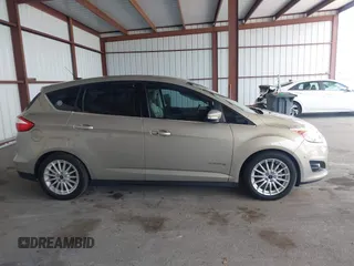 2016 Ford C-Max SEL z VIN 1FADP5BUXGL106531, wystawiony jako IAAI lot #42341433 z przebiegiem 74 854 mil mil oraz . Historia ofert i sprzedaży dostępna na DreamBid. Obrazek 13.