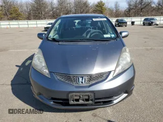 2013 Honda Fit с VIN JHMGE8H34DC080256, выставлен на аукционе Copart как лот 45559375 с пробегом 126 582 миль миль и Списание • Salvage title. История ставок и продаж доступна на DreamBid. Изображение 5.