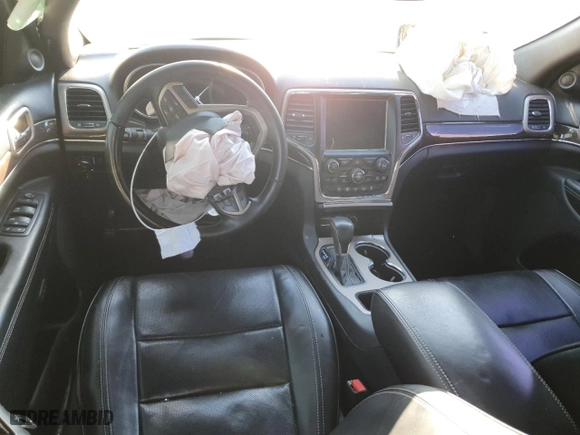 2017 Jeep Grand Cherokee Overland with VIN 1C4RJECGXHC659417, listed as a Copart auction lot 80168894 with 118,934 mi miles and Salvage Title. Bid and sale history available at carsss.com. Image 8.