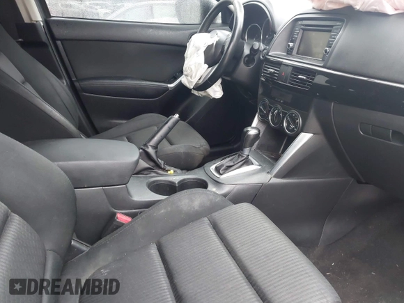 2015 Mazda CX-5 Touring with VIN JM3KE2CY4F0435563, listed as a IAAI auction lot 41311988 with 187,183 mi miles. Bid and sale history available at carsss.com. Image 5.