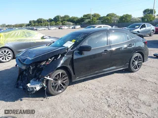 2021 Honda Civic Hatchback Sport with VIN SHHFK7H49MU233174, listed as a IAAI auction lot 41314513 with 30,919 mi miles. Bid and sale history available at carsss.com. Image 18.