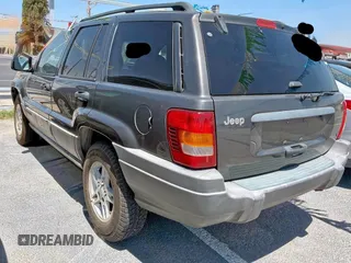 2002 Jeep Grand Cherokee Laredo с VIN 1J4GX48S22C310542, выставлен на аукционе Copart как лот 58444925 с пробегом 160 524 миль миль и Чистый • Clean title. История ставок и продаж доступна на DreamBid. Изображение 3.