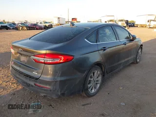 2020 Ford Fusion SE with VIN 3FA6P0HD7LR168404, listed as a IAAI auction lot 41763314 with 121,004 mi miles and . Bid and sale history available at DreamBid. Image 4.
