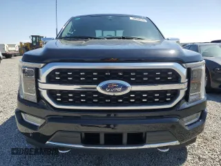 2023 Ford F-150 XL with VIN 1FTFW1E80PFC00462, listed as a Copart auction lot 50868535 with 23,119 mi miles and Salvage Title. Bid and sale history available at carsss.com. Image 5.
