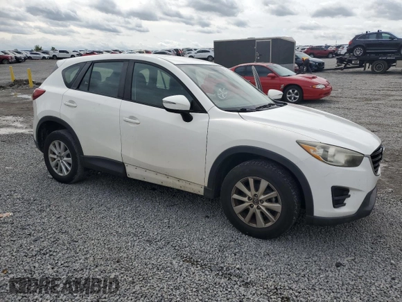 2016 Mazda CX-5 Sport with VIN JM3KE2BYXG0640842, listed as a Copart auction lot 54017605 with 197,504 mi miles and Clean Title. Bid and sale history available at carsss.com. Image 4.