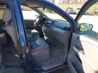 2010 Honda Odyssey EX-L with VIN 5FNRL3H76AB058912, listed as a IAAI auction lot 41558361 with 206,841 mi miles and . Bid and sale history available at DreamBid. Image 5.