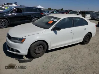 2014 Volkswagen Jetta S with VIN 3VW2K7AJ1EM325597, listed as a Copart auction lot 65006655 with Not provided miles and Clean title. Bid and sale history available at DreamBid. Image 1.
