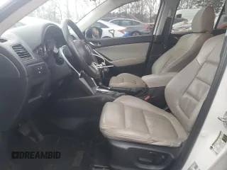 2015 Mazda CX-5 Grand Touring with VIN JM3KE2DY6F0504784, listed as a Copart auction lot 47671705 with 174,682 mi miles and Salvage Title. Bid and sale history available at carsss.com. Image 7.