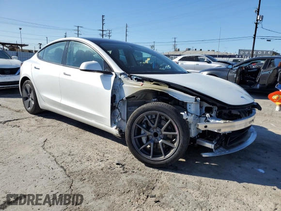2023 Tesla Model 3 with VIN 5YJ3E1EA7PF557358, listed as a Copart auction lot 48891985 with 20,673 mi miles and Salvage title. Bid and sale history available at DreamBid. Image 4.