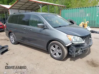 2008 Honda Odyssey Touring with VIN 5FNRL38908B100051, listed as a IAAI auction lot 42110484 with 190,567 mi miles and . Bid and sale history available at DreamBid. Image 1.