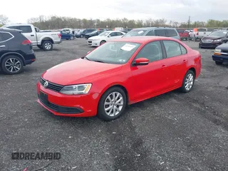 2011 Volkswagen Jetta Sedan SE w/Convenience & Sunroof PZEV with VIN 3VWDZ7AJ0BM061238, listed as a IAAI auction lot 42046655 with 174,131 mi miles. Bid and sale history available at carsss.com. Image 2.