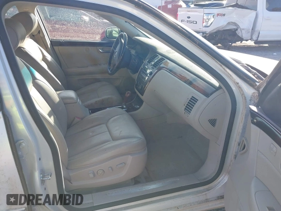 2007 Cadillac DTS Performance with VIN 1G6KD57947U221850, listed as a IAAI auction lot 41274564 with Not Provided miles and . Bid and sale history available at carsss.com. Image 5.