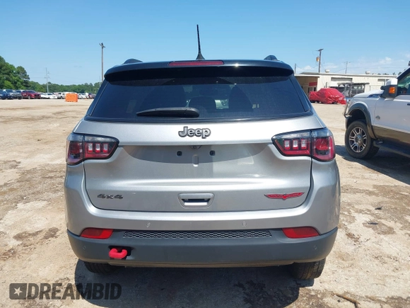 2023 Jeep Compass Trailhawk with VIN 3C4NJDDN3PT527995, listed as a IAAI auction lot 42218464 with 47,701 mi miles and . Bid and sale history available at DreamBid. Image 16.