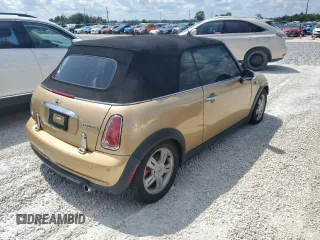 2005 MINI Convertible with VIN WMWRF334X5TG11889, listed as a Copart auction lot 55567995 with 169,717 mi miles and Salvage title. Bid and sale history available at DreamBid. Image 3.