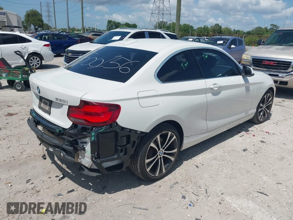 2020 BMW 2 Series 230i with VIN WBA2J1C05L7E54523, listed as a IAAI auction lot 42013928 with 43,659 mi miles. Bid and sale history available at carsss.com. Image 4.