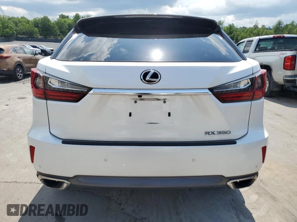 2019 Lexus RX 350 with VIN JTJBZMCA1K2041526, listed as a Copart auction lot 60991095 with 42,644 mi miles and Salvage title. Bid and sale history available at DreamBid. Image 6.