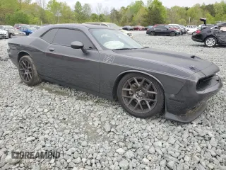 2018 Dodge Challenger T/A with VIN 2C3CDZBT2JH219413, listed as a Copart auction lot 53278745 with 133,257 mi miles and Salvage title. Bid and sale history available at DreamBid. Image 4.