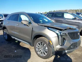 2020 Cadillac XT4 AWD Premium Luxury with VIN 1GYFZDR43LF095467, listed as a IAAI auction lot 41256992 with 21,418 mi miles. Bid and sale history available at carsss.com. Image 1.