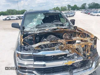 2017 Chevrolet Silverado 1500 LT with VIN 3GCUKREC2HG333665, listed as a IAAI auction lot 42238465 with 189,000 mi miles and . Bid and sale history available at DreamBid. Image 6.