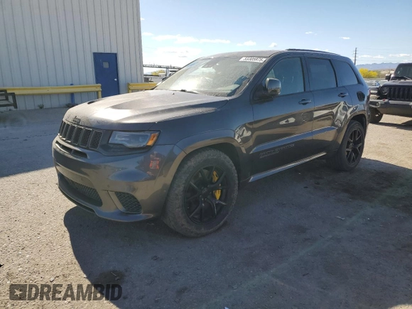 2018 Jeep Grand Cherokee Trackhawk with VIN 1C4RJFN96JC377074, listed as a Copart auction lot 53305975 with 27,625 mi miles and Salvage title. Bid and sale history available at DreamBid. Image 1.